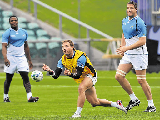 Chiliboy Ralepelle , Francois Hougaard and Bakkies Botha during the Springboks training session at the North Harbour stadium yesterday in Auckland where they play Namibia today Picture: DUIF DU TOIT/GALLO IMAGES