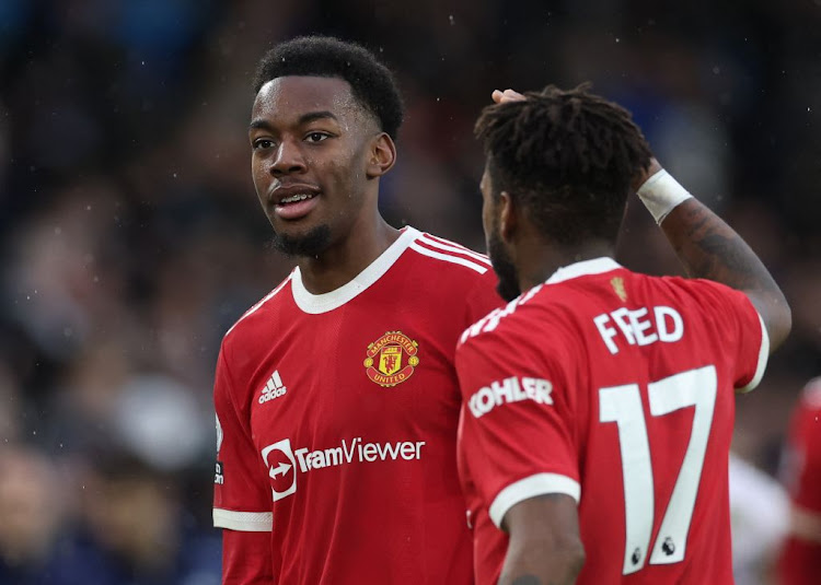 Manchester United's Anthony Elanga celebrates with Fred during the English Premier League match against Leeds United at Elland Road, Leeds, UK, on February 20 2022.