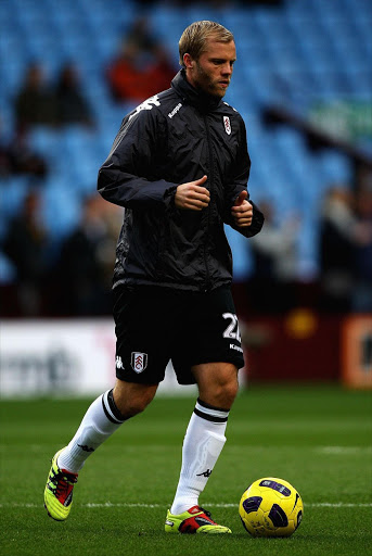Eidur Gudjohnsen of Fulham warms up ahead of the Premier League match between Aston Villa and Fulham at Villa Park on February 5, 2011 in Birmingham, England