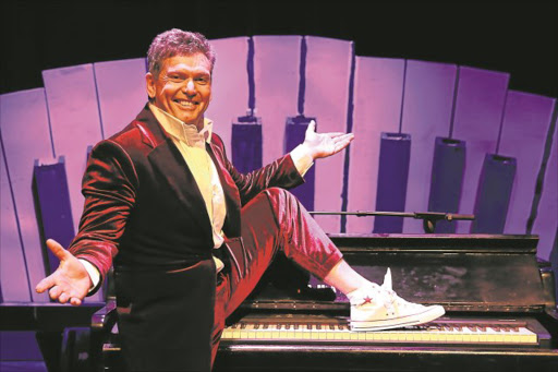 TICKLING THE IVORIES: Ian von Memerty strikes a dramatic pose while preparing for his latest show, ‘Keyboard Killers’ Picture: ALAN EASON