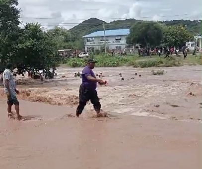 Some of the passenger being swept away by floods.