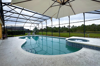 Peaceful south-facing pool deck at this Watersong vacation villa