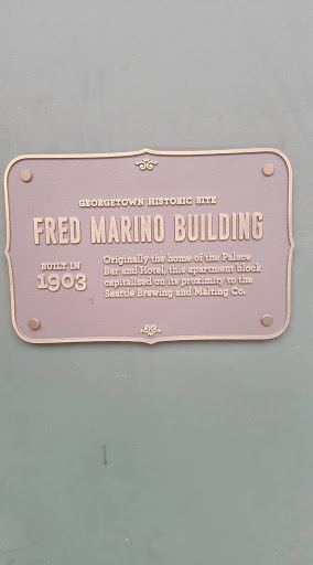 GEORGETOWN HISTORIC SITE FRED MARINO BUILDING  BUILT IN 1903 Originally the home of the Palace Bar and Hotel, this apartment block capitalized on its proximity to the Seattle Brewing and Malting Co.