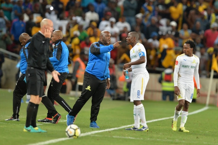 Pitso Mosimane and Hlompho kekana of Mamelodi Sundowns during the Absa Premiership match between Kaizer Chiefs and Mamelodi Sundowns at FNB Stadium on January 27, 2018 in Johannesburg.