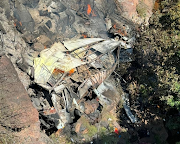 The wreckage of the bus that fell an estimated 50m from the Mmamatlakala Bridge, on the R518 road between Marken and Mokopane in the Waterberg District.