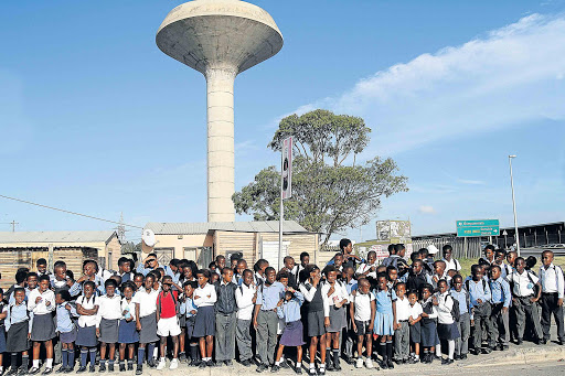 WAITING GAME: Hundreds of Nompumeleo pupils have been left stranded without means to get to their school 15km away as there is no scholar transport Picture: SIBONGILE NGALWA