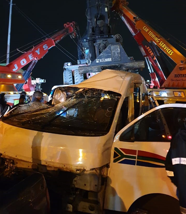 The carnage after a crane fell off a truck onto two taxis and a car in Durban.