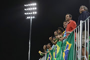 Brazil supporters watch on during the men's pool A match between Brazil and Belgium on Day 2 of the Rio 2016 Olympic Games at the Olympic Hockey Centre on August 7, 2016 in Rio de Janeiro, Brazil.  (Photo by Mark Kolbe/Getty Images)