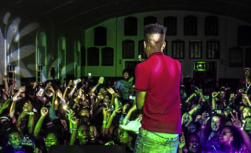 Rappers such as Nasty C, above, are all the rage at the outsourced school-hall socials that help to fill fundraising coffers.