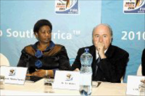 UNITED: Deputy President Phumzile Mlambo-Ngcuka and Fifa president Sepp Blatter look pensive at the Business Opportunity Conference yesterday. Pic. Mabuti Kali. 19/06/07. © Sunday World.