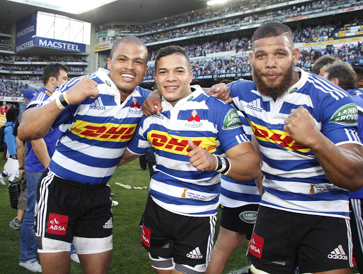Juan de Jongh, Cheslin Kolbe and Nizaam Carr of Western Province after the Absa Currie Cup Final match between DHL Western Province and Xerox Golden Lions at DHL Newlands on October 25, 2014 in Cape Town, South Africa.