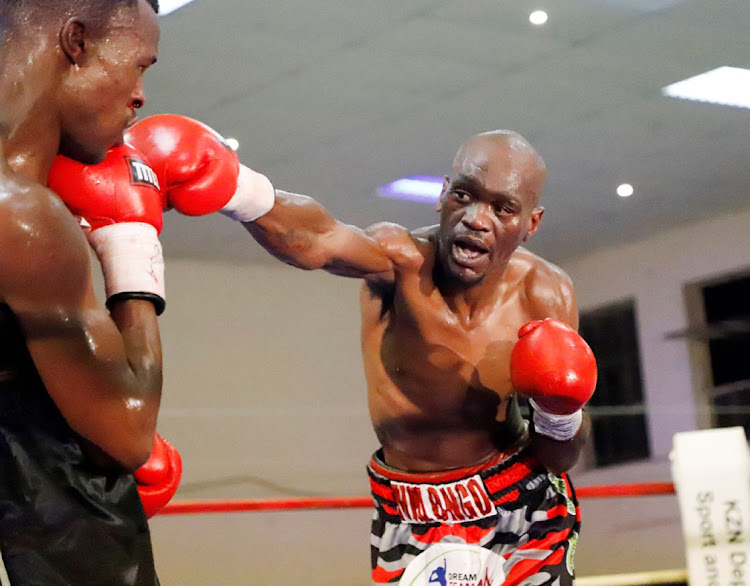 Nkululeko Mhlongo drills a straight into John Bopape who went on to win the fight in Durban.