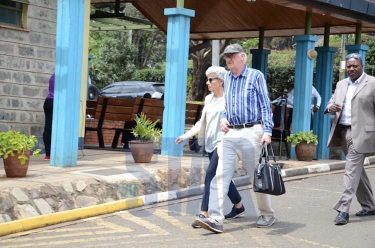 Dutch Tycoon's sister accompanied by the husband with chief head of security Peter Kang'ara arrives at the Chiromo mortuary./DOUGLAS OKIDDY