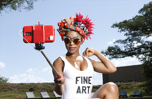 Nomzamo Mbatha, star of 'Tell Me Sweet Something', snaps a selfie by the pool.
