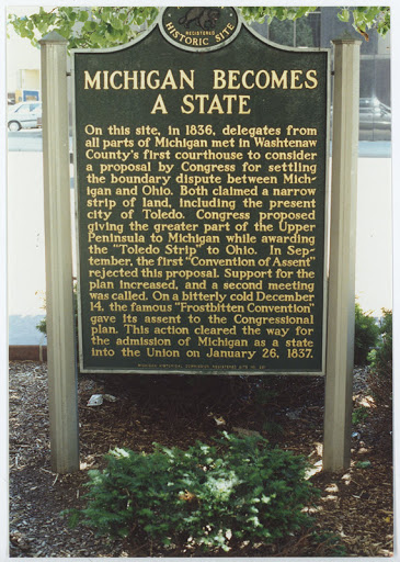 On this site in 1836, delegates from all parts of Michigan met in Washtenaw County’s first courthouse to consider a proposal by Congress for settling the boundary dispute between Michigan and...