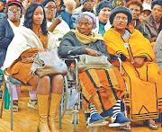 Nelisa  Sobukwe (left), Zondeni Veronica  Sobukwe and family friend Vaida Sokopo during the handover of land for a memorial museum to Robert  Sobukwe in Graaff-Reinet. File photo.