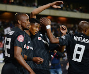 Orlando Pirates and Bafana Bafana winger Vincent Pule celebrates with teammates after scoring the opening goal in the 3-1 Absa Premiership win over SuperSport United at Orlando Stadium on Saturday September 15 2018.   