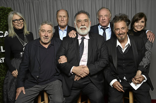 GANG'S ALL HERE: Diane Keaton, Robert De Niro, Robert Duvall, Francis Ford Coppola, James Caan, Al Pacino and Talia Shire pose for a portrait at The Godfather 45th anniversary screening during 2017 Tribeca Film Festival closing night at Radio City Music Hall in New York City.
