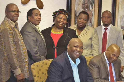 WELCOMED: ANC and legislature chief whip Mzoleli Mrara, left, speaker Noxolo Kiviet, her deputy Bulelwa Tunyiswa and legislature’s acting chief operations officer advocate Innocent Netshitumbu during the swearing in of ANC MPLs Temba Tinta and Thando Ngcolomba, both seated, at the legislature this week Picture: SUPPLIED