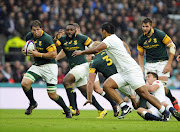 South Africa's Willem Alberts (L) in action during the Rugby International test match between England and South Africa at Twickenham Stadium in London, Britain, 12 November 2016.  EPA/GERRY PENNY