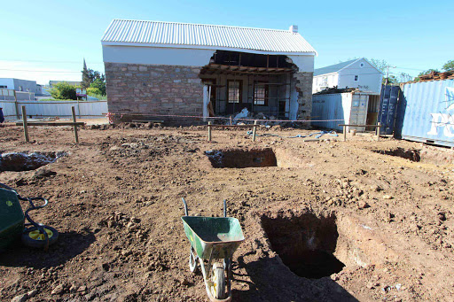 GAPING HOLE: Damage to an historic Grahamstown house during excavations on a local building site, has caused widespread outrage