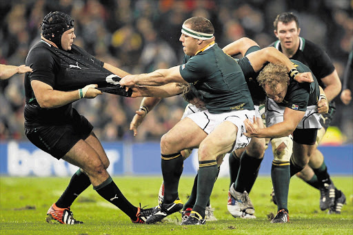 Springbok prop Heinke van der Merwe and Mike Ross of Ireland tussle as the Bok maul rolls forward during last Saturday's Test in Dublin. The South African forwards will look to dominate again when they meet Scotland this Saturday Picture: PATRICK BOLGER/GALLO IMAGES