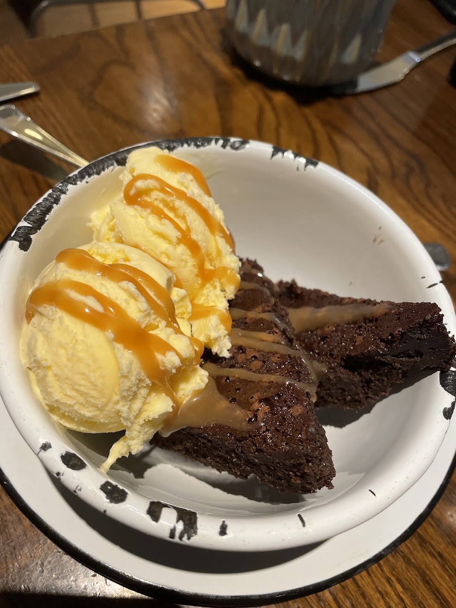 GF brownie with vanilla ice cream and salted caramel sauce