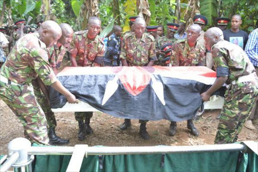 The burial of Kenya Defence Forces soldier Corporal David Muthuri, who was killed in El Adde in Somalia, at Karachi village in Tigania East, February 3, 2016. Photo/KIRIMI MURITHI