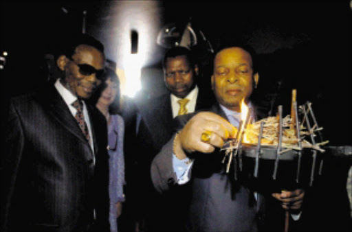 TRADITIONAL: King Goodwill Zwelithini burns the impepho (herbs) during the official opening of the Umgungundlovu multimedia centre in KZN as part of Reconciliation Day yesterday. Pic. SIYABONGA MOSUNKUTU. 11/12/2009. © Sowetan.