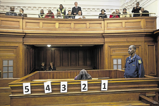 Xolile Mngeni in the dock at the Cape Town High Court yesterday at the beginning of his trial for the 2010 murder of honeymoon bride Anni Dewani Picture: HALDEN KROG