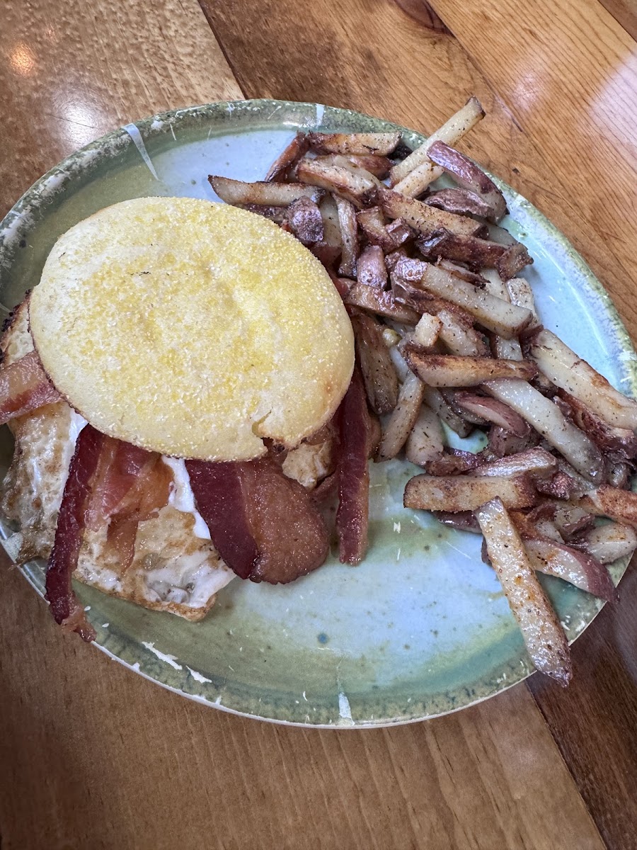 Egg sandwich on a (glutino brand) english muffin with potatoes