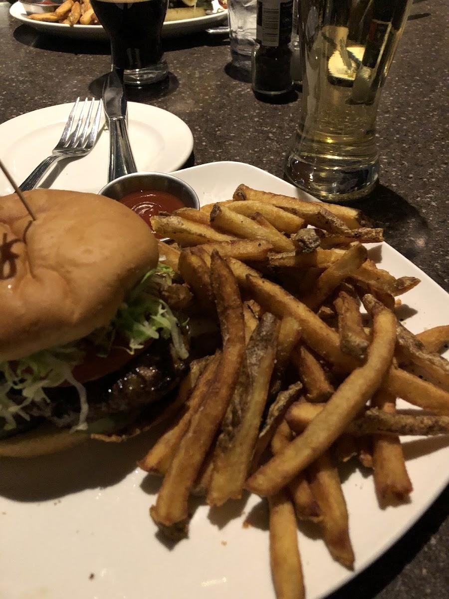 Gluten and dairy free hamburger and fries with bold rock cider on tap