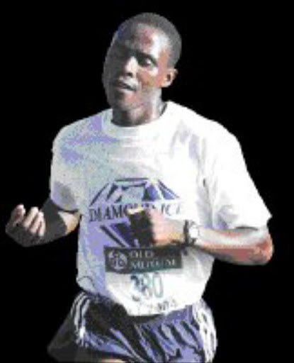 DETERMINED: Norman Dlomo. Pic. Antonio Muchave. 13/12/04. © Sowetan.