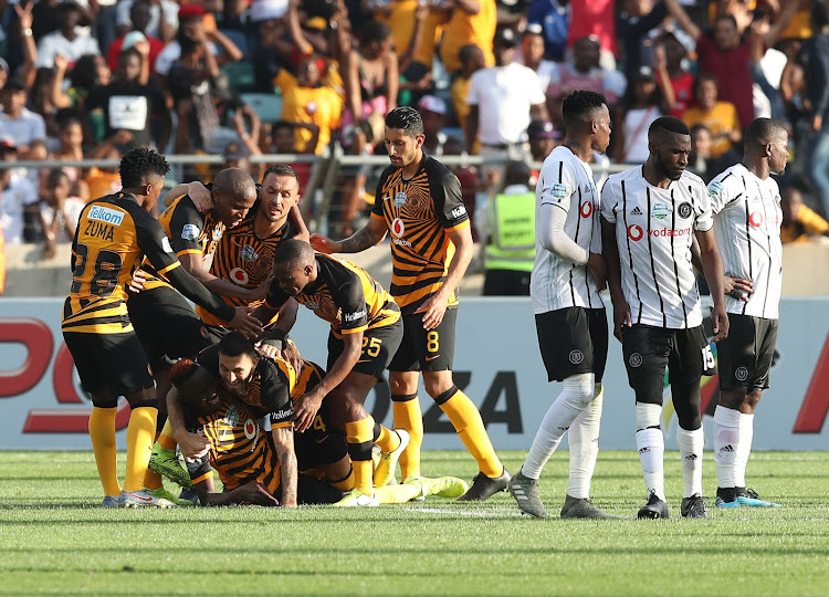 Daniel Cardoso celebrates with teammates after scoring the fourth goal of the match to make it 2-2.