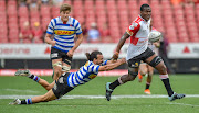 Dillyn Leyds of Western Province misses a tackle on Hacjivah Dayimani of the Xerox Golden Lions during the Currie Cup at Emirates Airline Park in Johannesburg on September 15, 2018.  