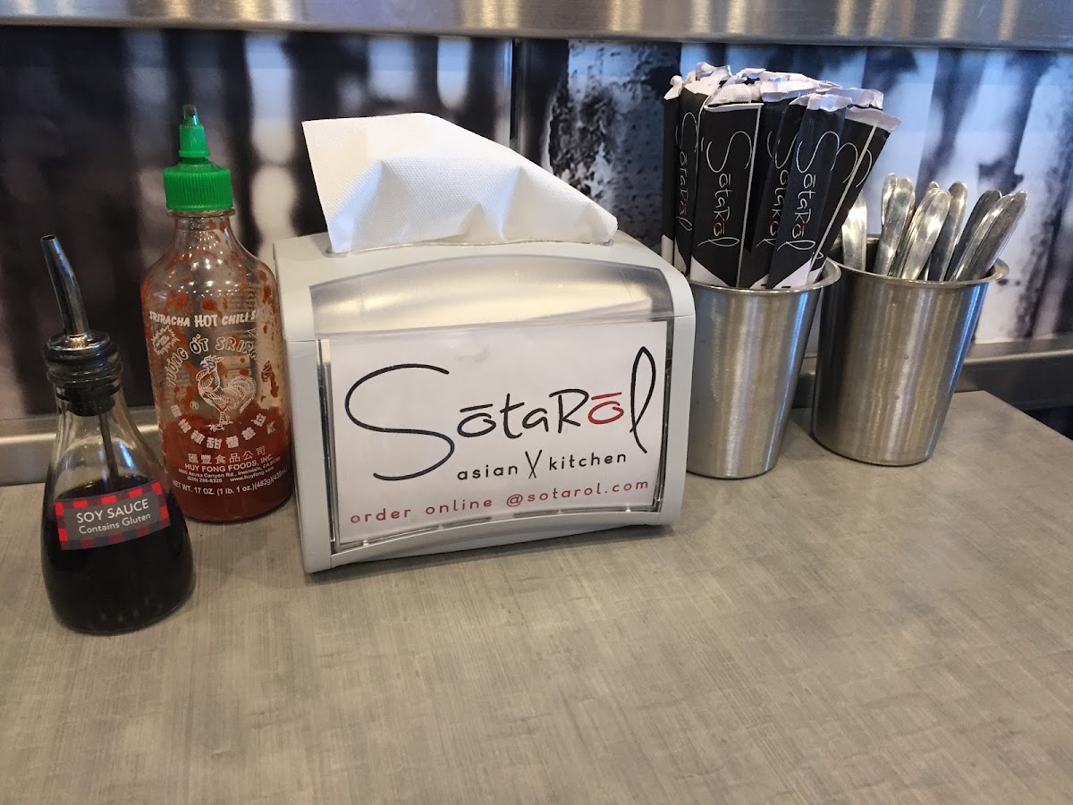 Labeled sauce at each table.