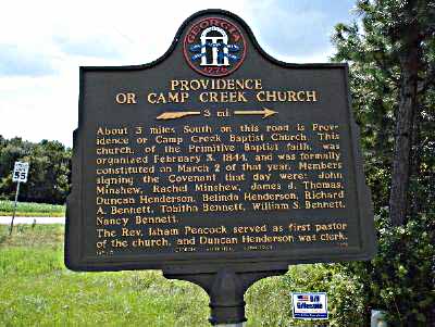 --- 3 mi. ---> About 3 miles South on this road is Providence or Camp Creek Baptist Church. This church, of the Primitive Baptist faith, was organized February 3, 1844, and was formally...
