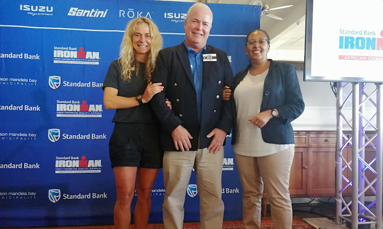 Ironman managing director Keith Bowler is flanked by double Ironman age group world champion Michelle Enslin (left) and Desiree Pooe head of sponsorships at Standard Bank (right).