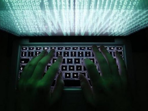 A man types on a computer keyboard in Warsaw in this February 28, 2013 illustration file picture. Photo/REUTERS