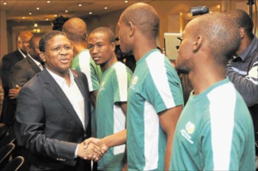 GOOD LUCK: Minister of Sport and Recreation Fikile Mbalula bids Baby Bafana farewell at the Holiday Inn Garden Court in Kempton Park yesterday. Photo: gallo Images