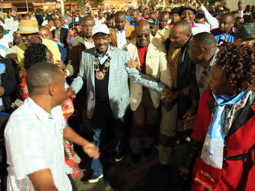 Wiper leader Kalonzo Musyoka and Machakos Senator Johnson Muthama meet supporters at the Jomo Kenyatta International Airport in Nairobi, after Kalonzo returned from New York, August 21, 2016. /JOSEPH NDUNDA