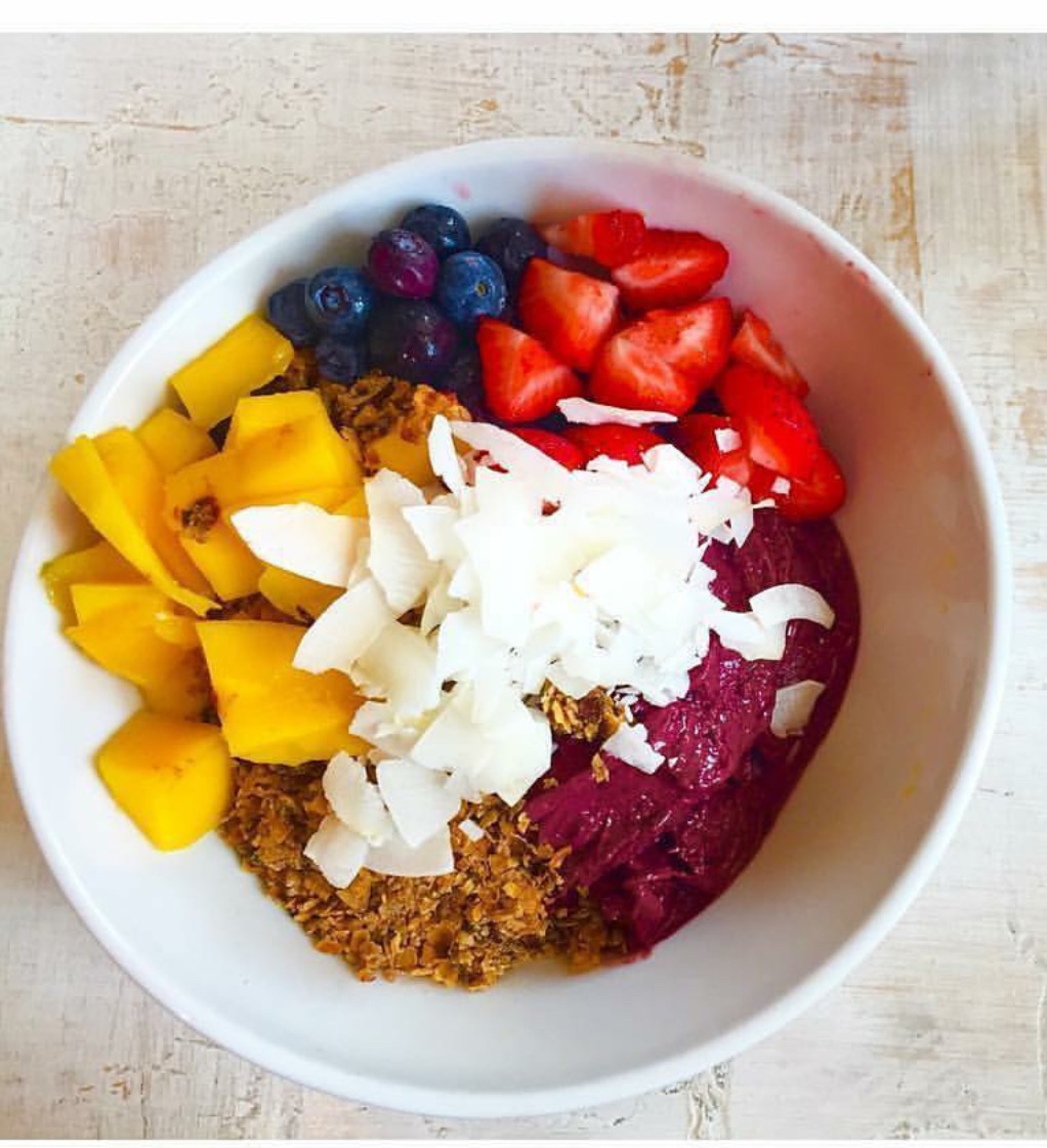 Acai Bowl with banana, house made granola, seasonal fruit, local honey and coconut flakes at Lilikoi Organic Living