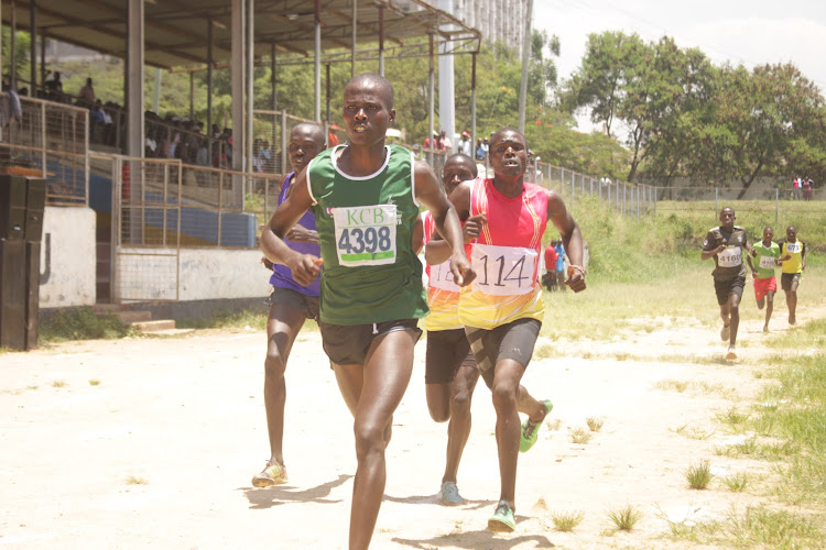 Athletes compete in the boys 3, 000m steeplechase at Moi Stadium in Kisumu