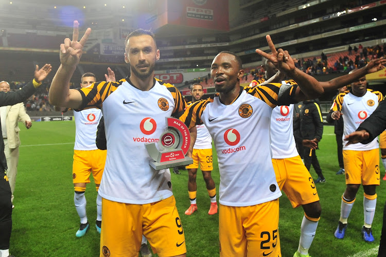 New Kaizer Chiefs Serbian striker Samir Nurkovic pose with his teammate and Bernard Parker after a match.