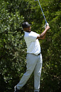 Former Bafana Bafana striker Mark Williams plays a shot at the Gary Player Invitational. 