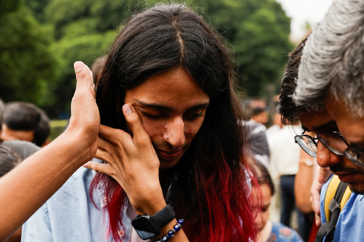 A member of the lesbian, gay, bisexual and transgender (LGBT) community reacts on the day of the verdict on same-sex marriage by the Supreme Court in New Delhi, India, October 17, 2023.