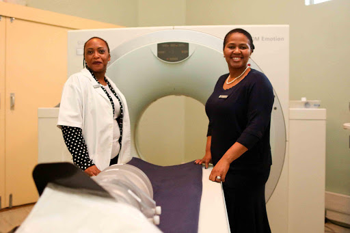 PIONEERS: Dr Nomhle Makaula-Chimusoro and Dr Nwabisa Macingwane-Ngcuka are breaking barriers as the only two black women radiologists in the Eastern Cape private sector. They are co-founders of Triple M Radiologists, where a CT scan is one of the services offered Picture: STEPHANIE LLOYD