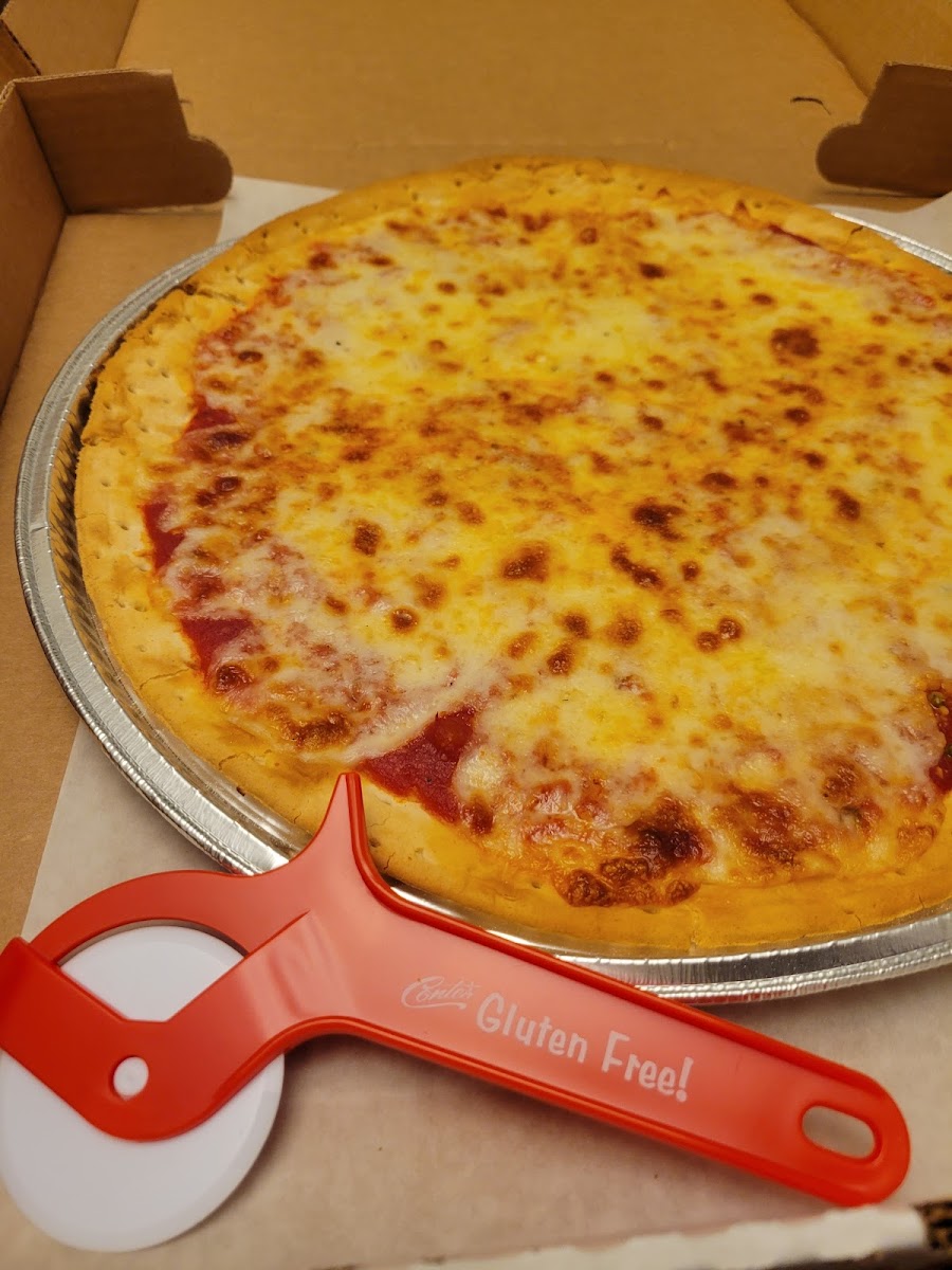 Gluten free pizza, came with its own pizza cutter!