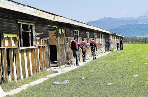 STATE OF DISREPAIR: Vukile Tshwete Senior Secondary School in Keiskammahoek is nothing but a dilapidated wooden structure that has fallen apart over the years. There was no sign of construction work at the site earmarked for the construction of the new school about 300m away Picture: RANDELL ROSKRUGE
