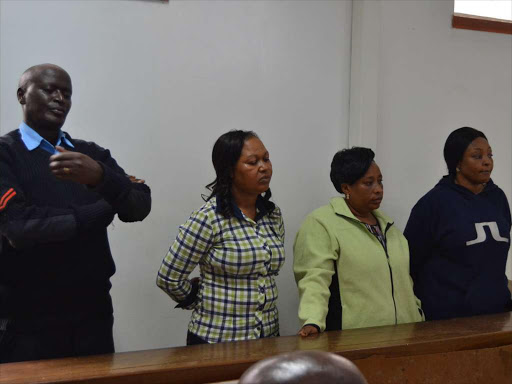 Margaret Mutei, Mary Waithera and Sarah Wangui in a Kitui court yesterday. They are accused of stealing Sh28 million from the Kitui county government.